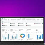 Imagem de computador aberto com tela de dashboard, ilustrando um conteúdo da Ramo sobre Autonomous Enterprise.